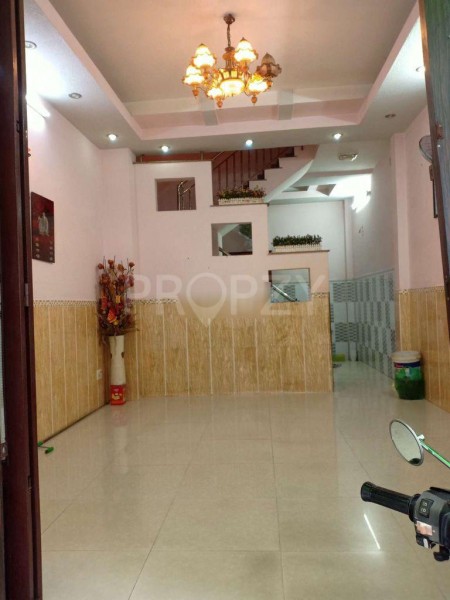 Cho thuê nhà nguyên căn 1 trệt 2 lầu + sân thượng phường 13 Tân Bình