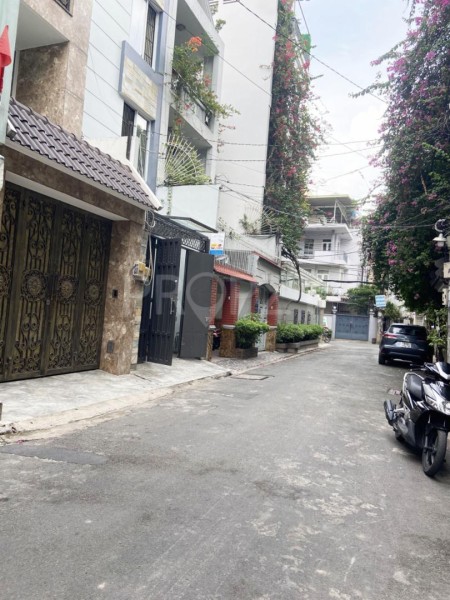 Nhà nguyên căn 1 trểt 4 lầu hẻm xe hơi Nguyễn Cảnh Dị - Tân Bình