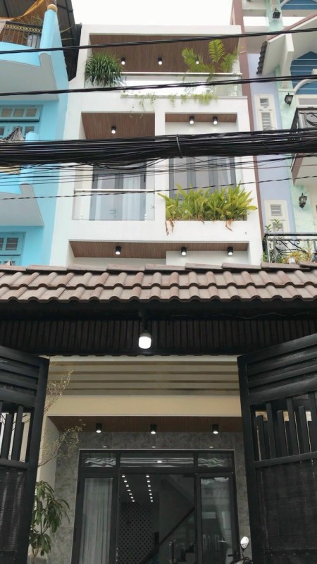 Nhà 4x16m, 1 trệt 3 lầu có sân thượng, sân để xe ngay mặt tiền đường số 4 Gò Vấp