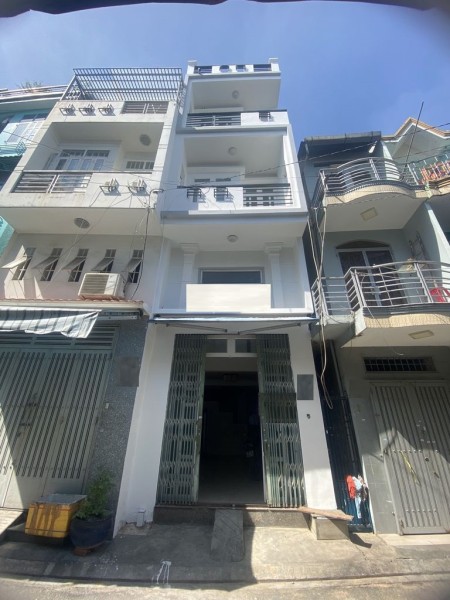 Nhà nguyên căn cho thuê Lạc Long Quận có trệt và lửng, 2 tầng lầu, 2 phòng ngủ và 4 phòng vệ sinh