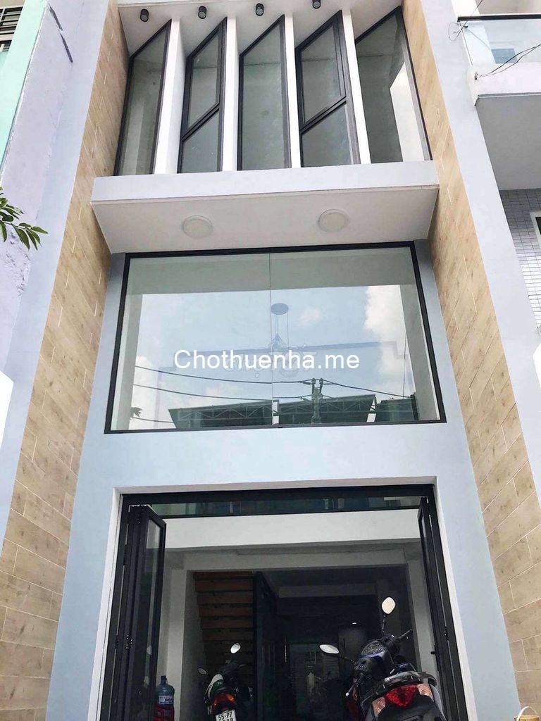 Cho thuê nhà nguyên căn trệt 2 lầu và sân thương, dtsd 300m2 siêu rộng tại Phan Đăng Lưu Bình Thạnh