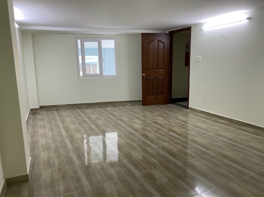 Nhà làm căn hộ dịch vụ Chu Văn An diện tích 7x18, hầm, trệt, 6 lầu giá 90 triệu/tháng