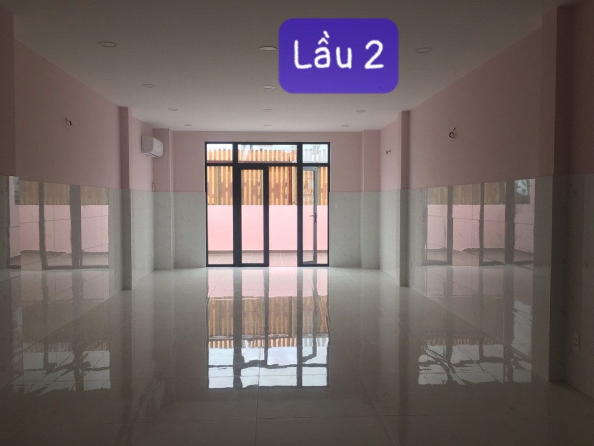 Tòa nhà 1T,2L,1ST Có Thang Máy MT Lê Văn Lương( ngã 3 LVL & Trần Xuân Soạn)